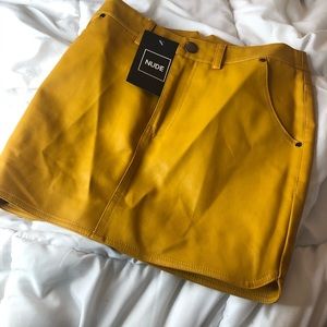 leather yellow skirt